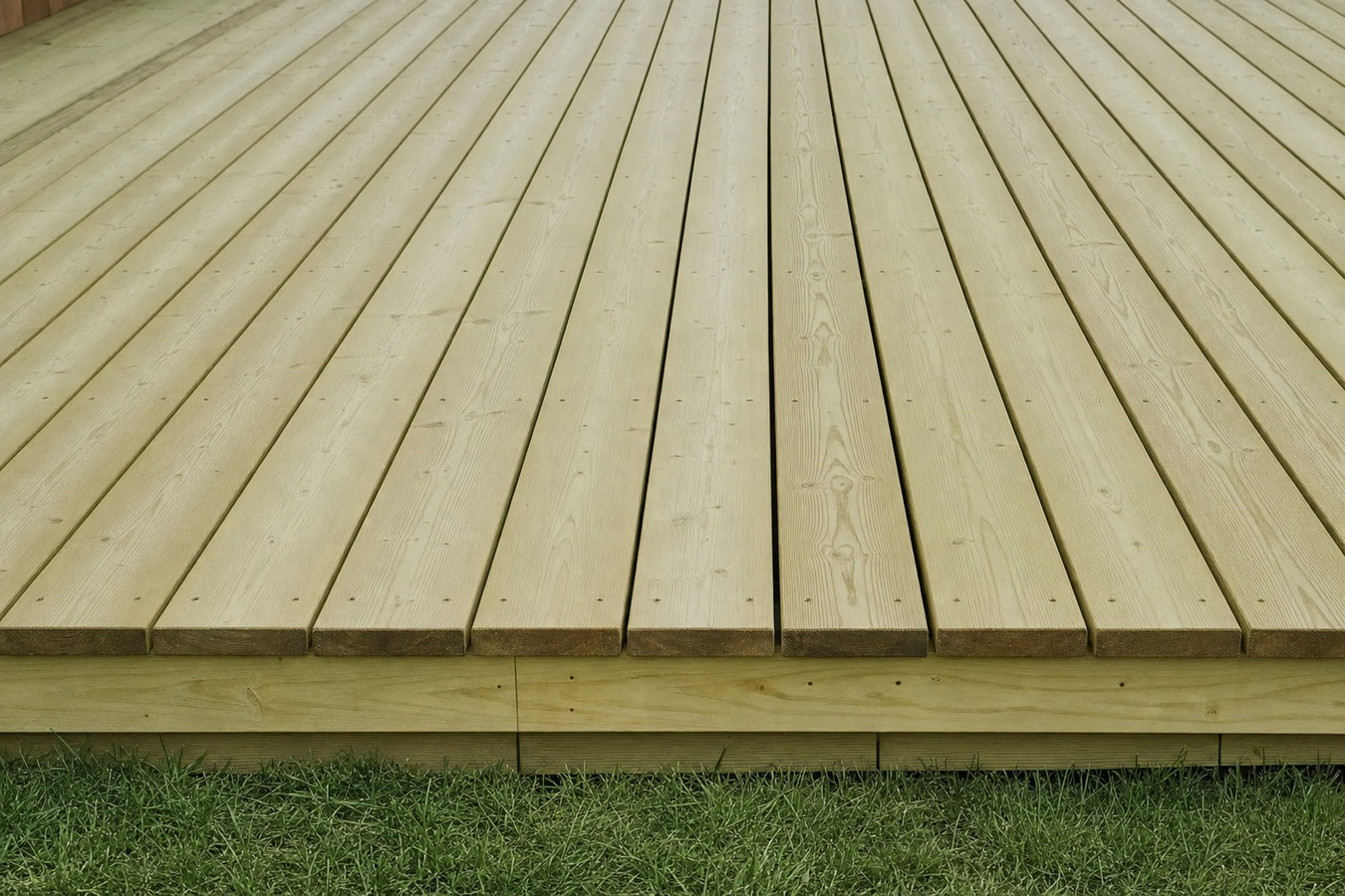 Pressure-treated wood deck construction